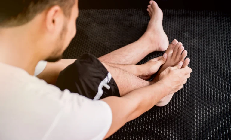 Plantar Fasciitis Treatment Camrose 2 Person performing a foot mobility assessment to support Foot and Ankle Pain Relief Camrose and improve flexibility, strength, and joint function.